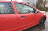Suzuki Alto door in red drivers front 2009 SZ3